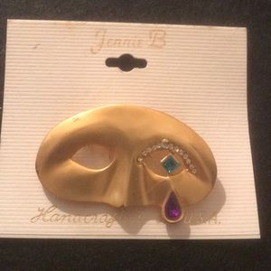 Masquerade pin